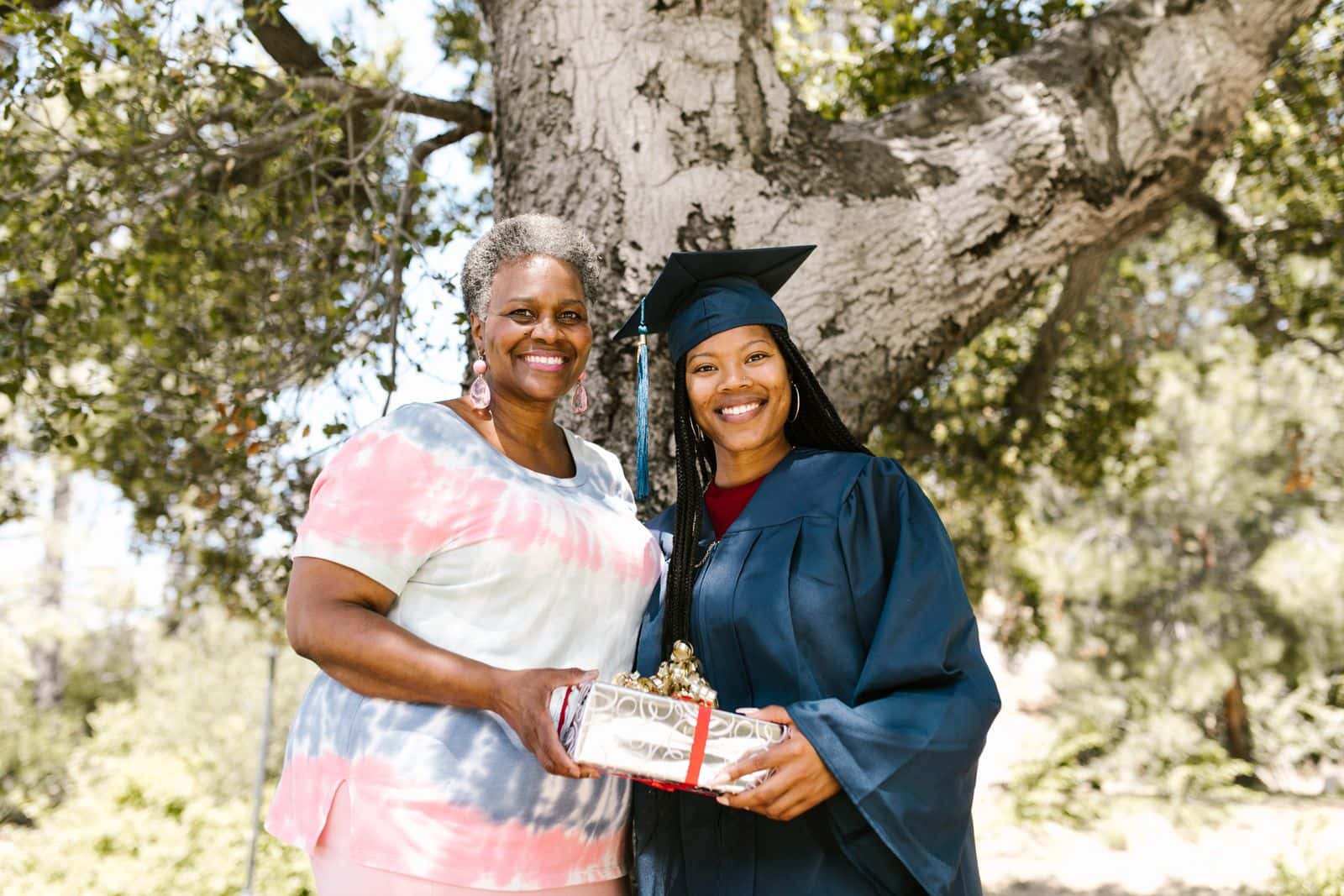 Graduate celebrating with her mother after the ceremony