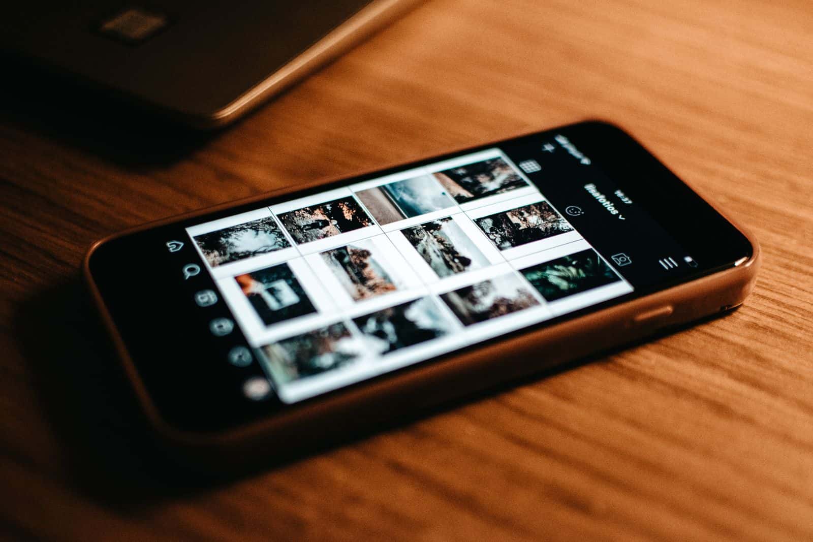 Smartphone displaying a grid of photographs