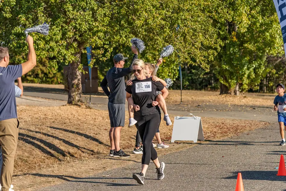 Participants and supporters at a community fun run